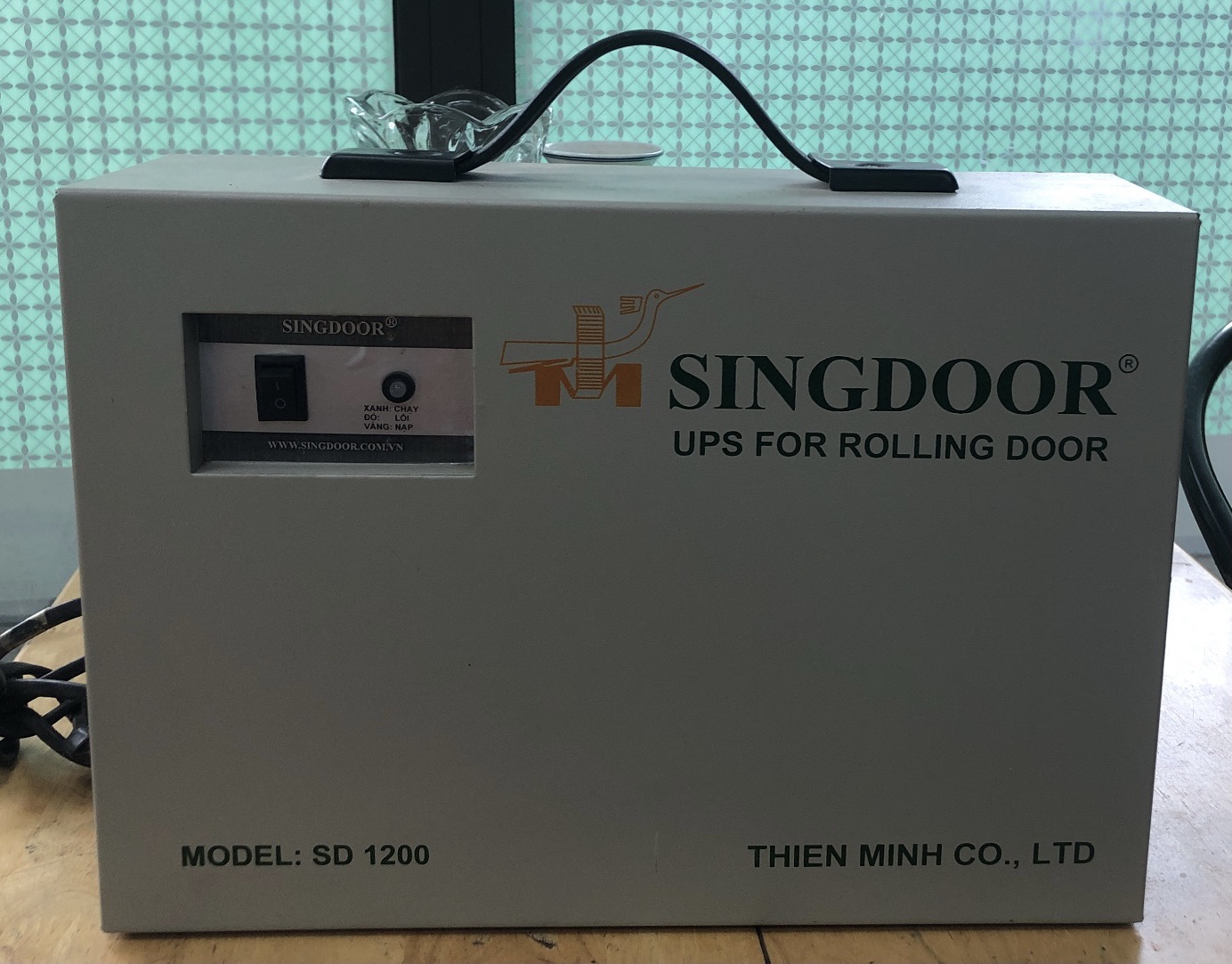 Lưu điện cửa cuốn Singdoor